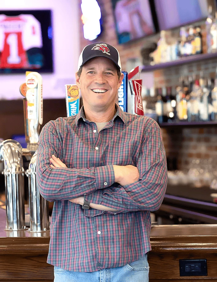 ਐਡ ਜੇਨ: ਐਸਪਨ ਦਾ ਕੋਚ ਤੇ ਕਮੇਊਨਿਟੀ ਵਾਲਾ ਦੋਸਤ